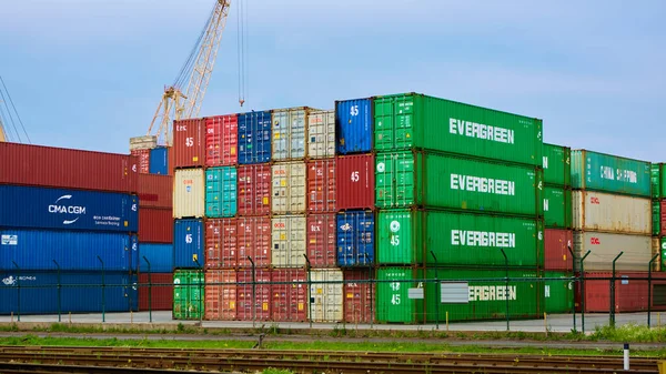 Odessa, Ukraine - May 19, 2021: Freight containers in the port terminal. Containers labeled Evergreen in the foreground. — Stock Photo, Image