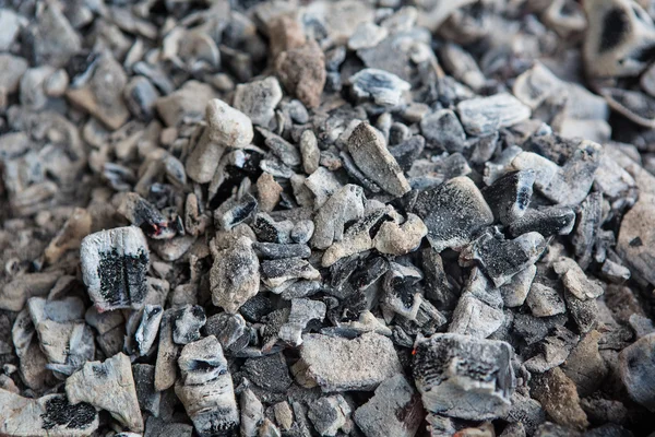 Black coals in the fireplace — Stock Photo, Image