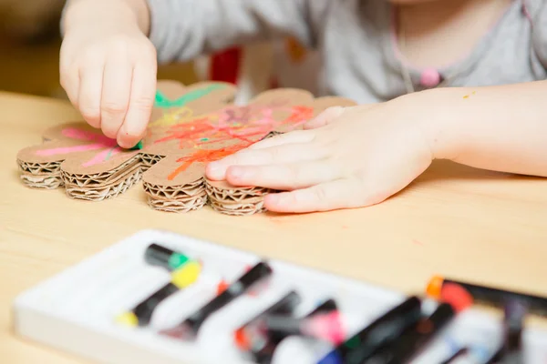 Little female baby painting with colorful paints — Stock Photo, Image