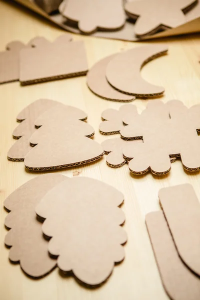 Cardboard toys for the Christmas tree or garland. New year decorations. — Stock Photo, Image