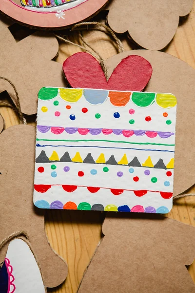 Kartonnen speelgoed voor de kerstboom of garland. Nieuwjaar decoraties. — Stockfoto