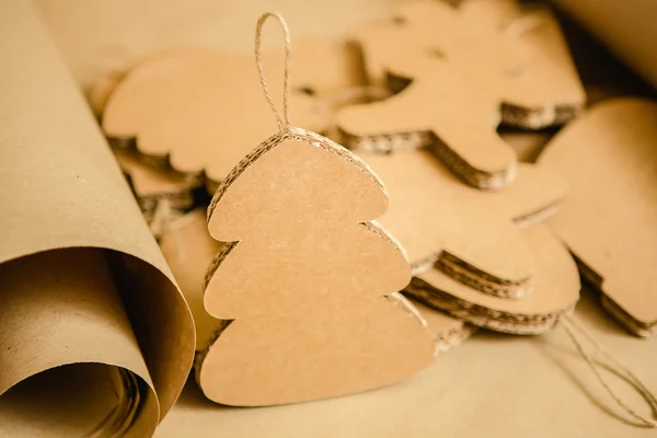 Cardboard toys for the Christmas tree or garland. Creative decorations. Selective Focus — Stock Photo, Image