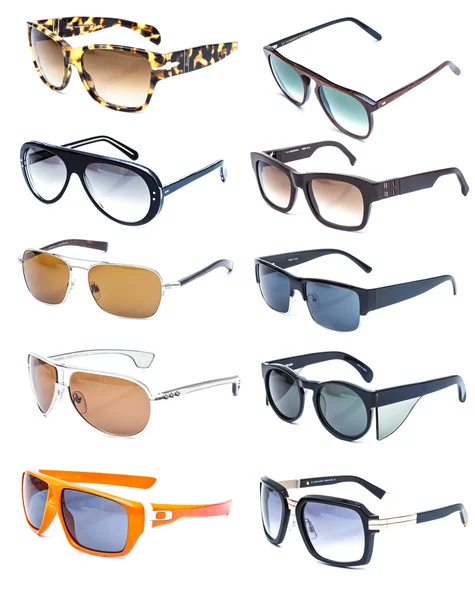 Collection de lunettes de soleil colorées sur fond blanc — Photo