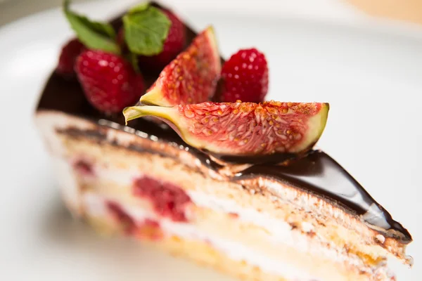 Cake with chocolate, fig and raspberry — Stock Photo, Image