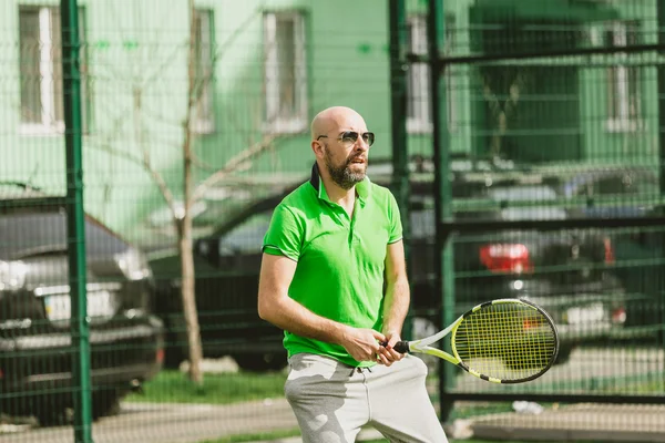 Man play tennis outdoor — Stock Photo, Image