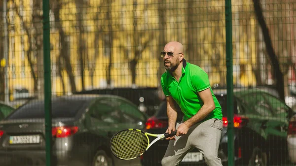 Man play tennis outdoor — Stock Photo, Image