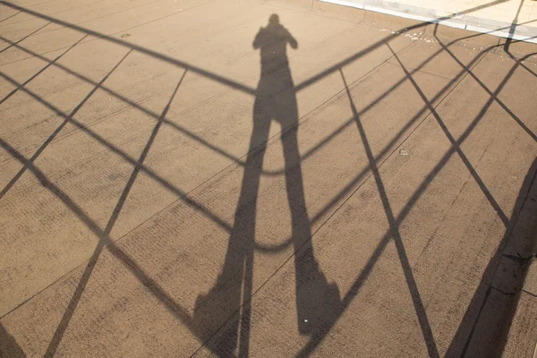Shadow of a photographer — Stock Photo, Image
