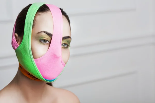 Closeup portrait of beautiful young woman with creative makeup — Stock Photo, Image