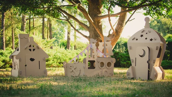 Eco-friendly toys made of cardboard ship, house and  spaceship. — Stock Photo, Image