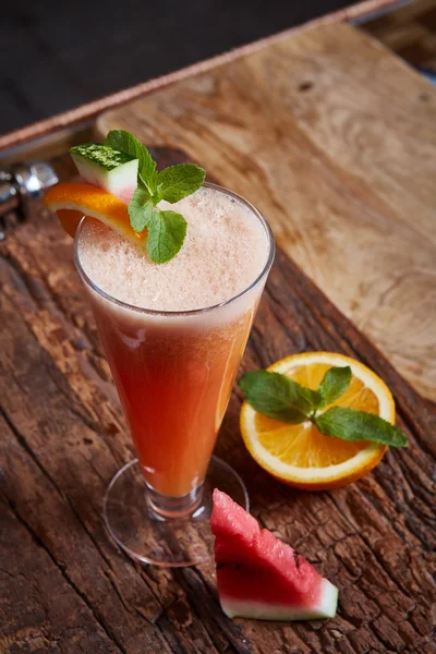 Glass watermelon and orange smoothie — Stock Photo, Image