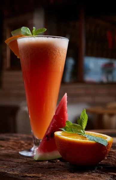 Glass watermelon and orange smoothie — Stock Photo, Image