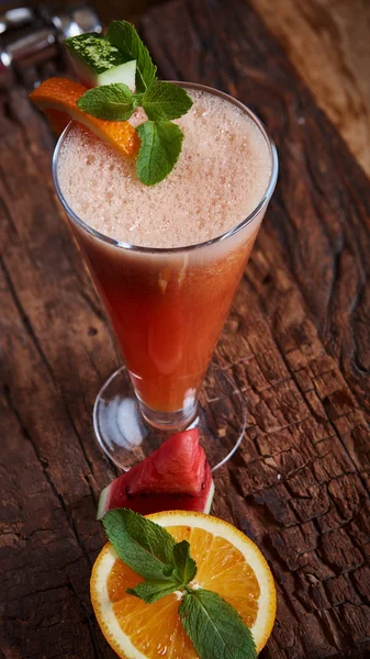 Glass watermelon and orange smoothie — Stock Photo, Image