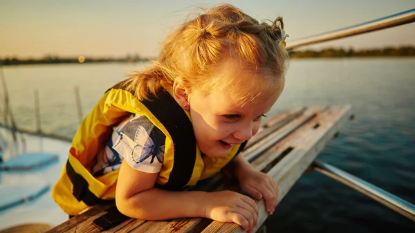 Little girl enjoying ride on yacht — Stock Photo, Image