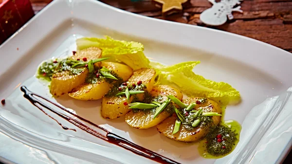 Appetizer of grilled celery with greens — Stock Photo, Image