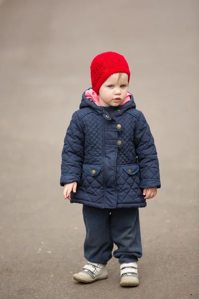 Little girl on a park alley — Stock Photo, Image