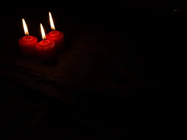 Tři hořící svíčky — Stock fotografie