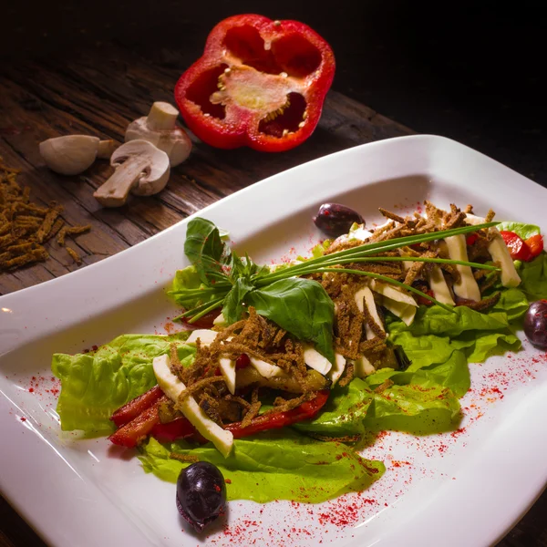 Salad from aubergine,mozzarella and tomato with basil. — Stock Photo, Image