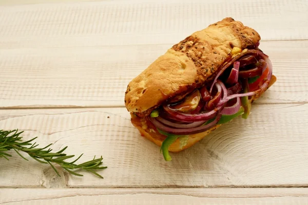 Sandwiches with salad, onion, salami, pepperoni, ham, cheese — Stock Photo, Image