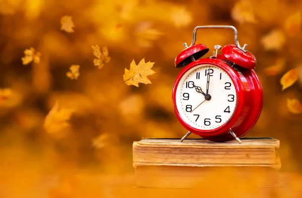 Red Clock Books Leaves Back School Autumn Daylight Savings Time Stock Image