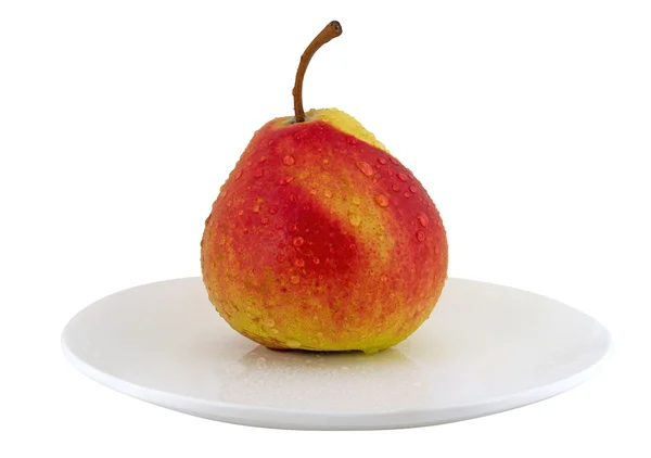 Pear on a plate — Stock Photo, Image