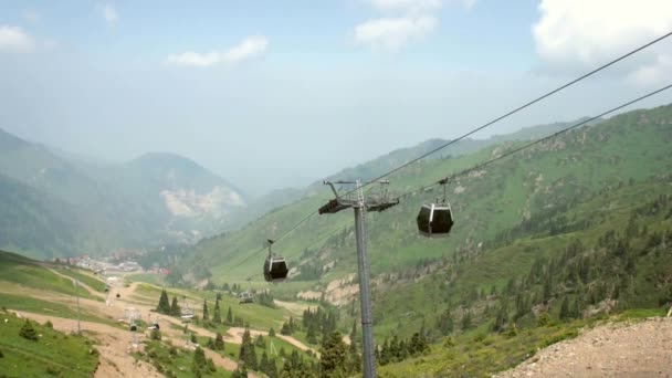 Cable car through Alps mountains in the summer — Stock Video