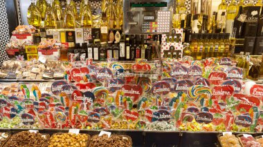 Lollipops and olive oil at La Boqueria market