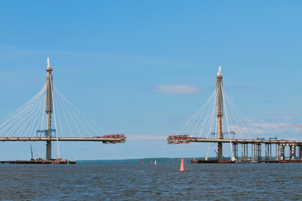Construction of bridge through river. St. Petersburg, Russia Stock Photo