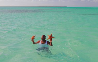 Starfishes elinde ile rehberlik. Palmilla, Dominik Cumhuriyeti