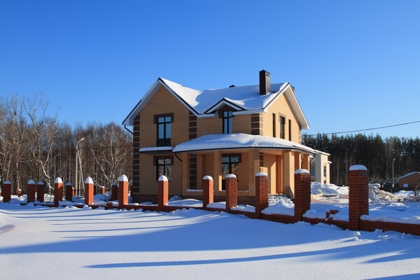 Low country construction.Two-storeyed brick cottage