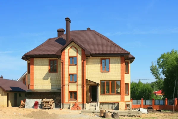 Construção de casa de tijolo — Fotografia de Stock