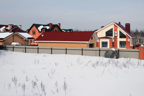 Osada domków w zimie — Zdjęcie stockowe