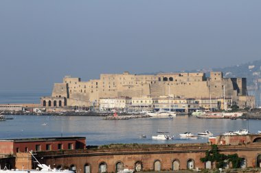 Ancient fortress on Mediterranean Sea. Naples, Italy clipart