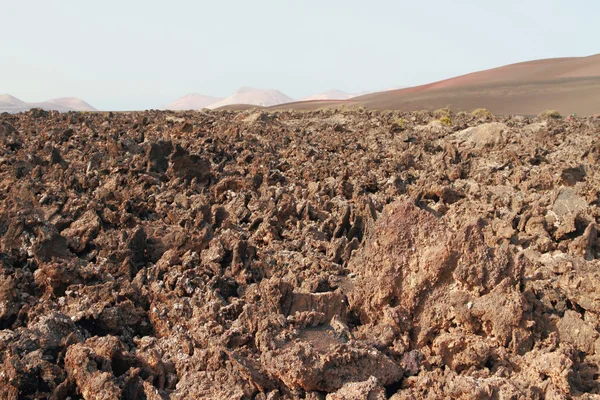 Stiffened lava in Timanfaya park. Lanzarote, Spain — Stock Photo, Image