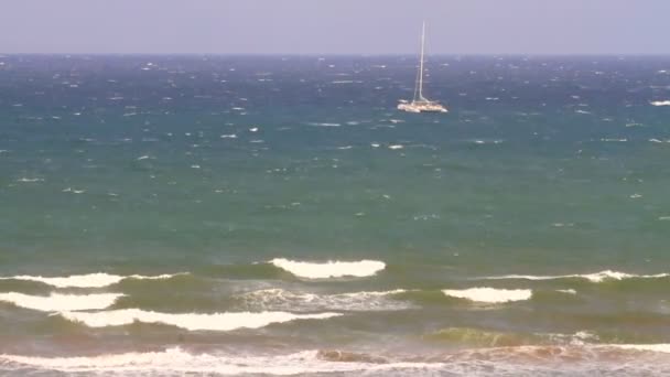 Uneasy sea and catamaran — Stock Video