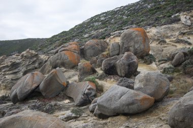 Large rocks in Blowholes sight in Torndirrup National Park near Albany clipart