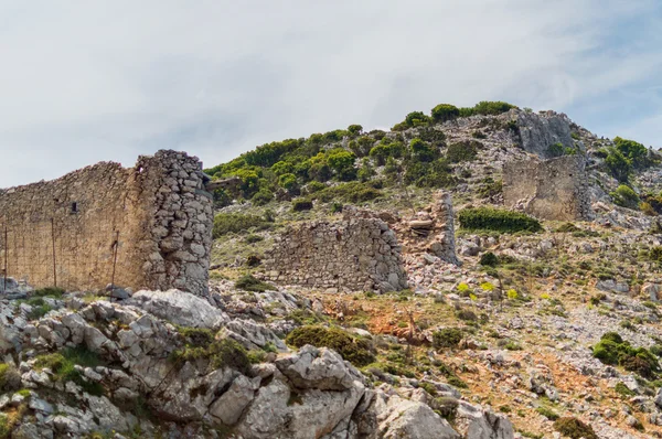 Ruins of ancient bridge in mountains