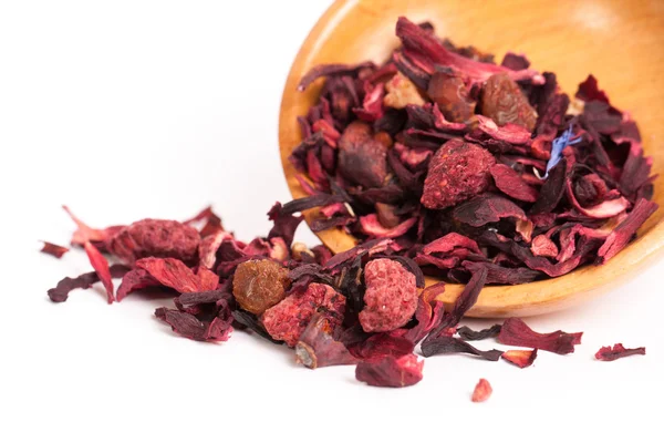 Dry tea in wooden plates, on white background. Leaves of red, green and black tea. Macro photo. — Stock Photo, Image