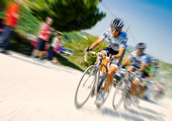 Meno on bike — Stock Photo, Image