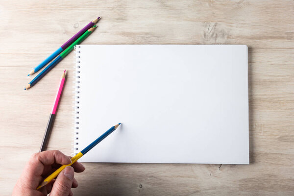 pencils on a notebook