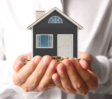 ev sahipliği temsil eden holding evi 