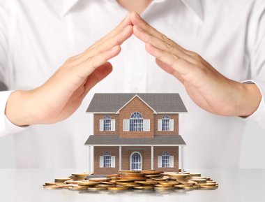 ev sahipliği temsil eden holding evi 