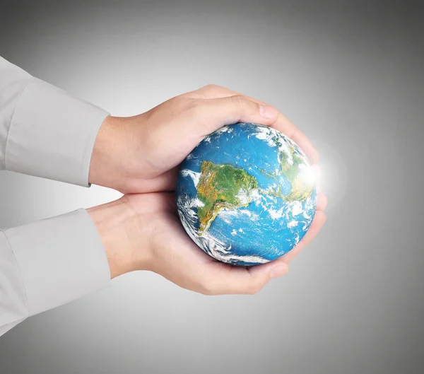 Hand holding globe Elements of this image furnished by NASA — Stock Photo, Image