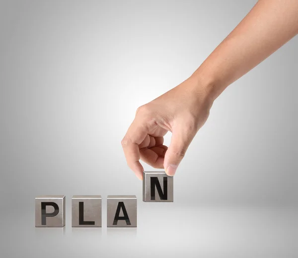 Concept word forming  metal box in the open hand — Stock Photo, Image