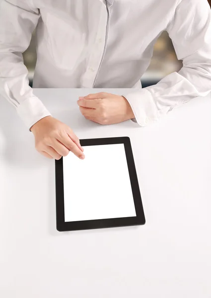 hands holding and pointing on contemporary tablet