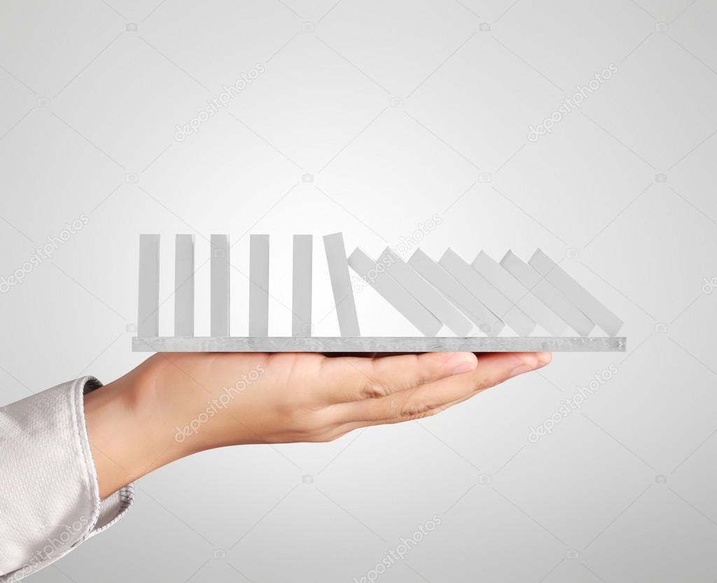 hand stop  dominoes continuous toppled