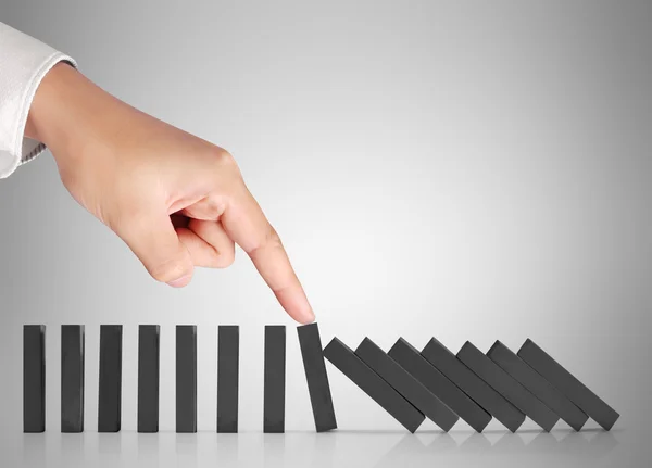 Hand stop  dominoes continuous toppled — Stock Photo, Image