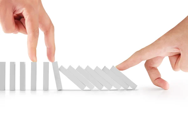 Hand stop  dominoes continuous toppled — Stock Photo, Image