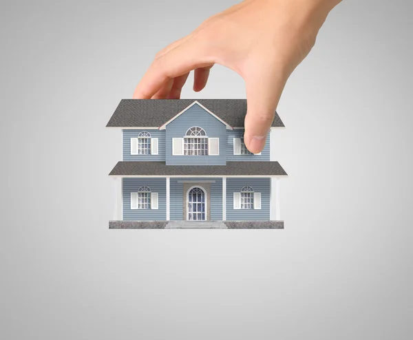 Hypotheek concept van huis uit hand — Stockfoto