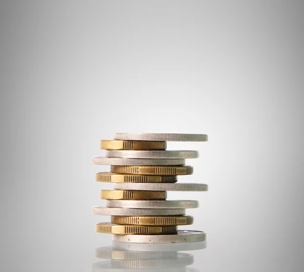 Coins graph stock market — Stock Photo, Image