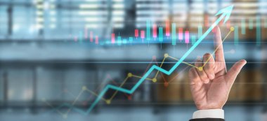 İşadamı, işinde grafik büyümesi ve grafik artışı için olumlu göstergeler planlıyor